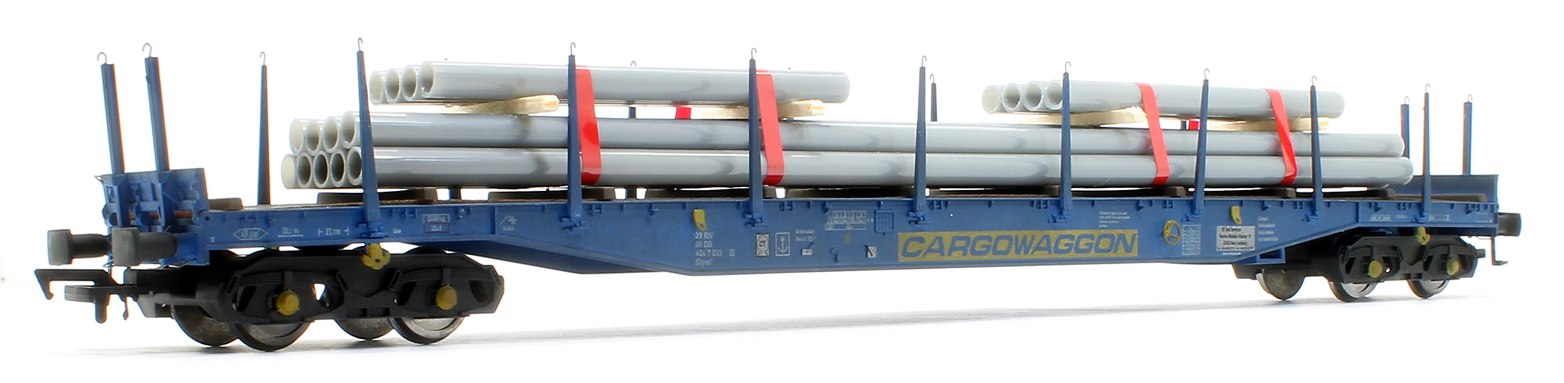 5113 IGA Cargowaggon bogie flat in CARGOWAGGON blue with pipe load 4647 033 - Weathered